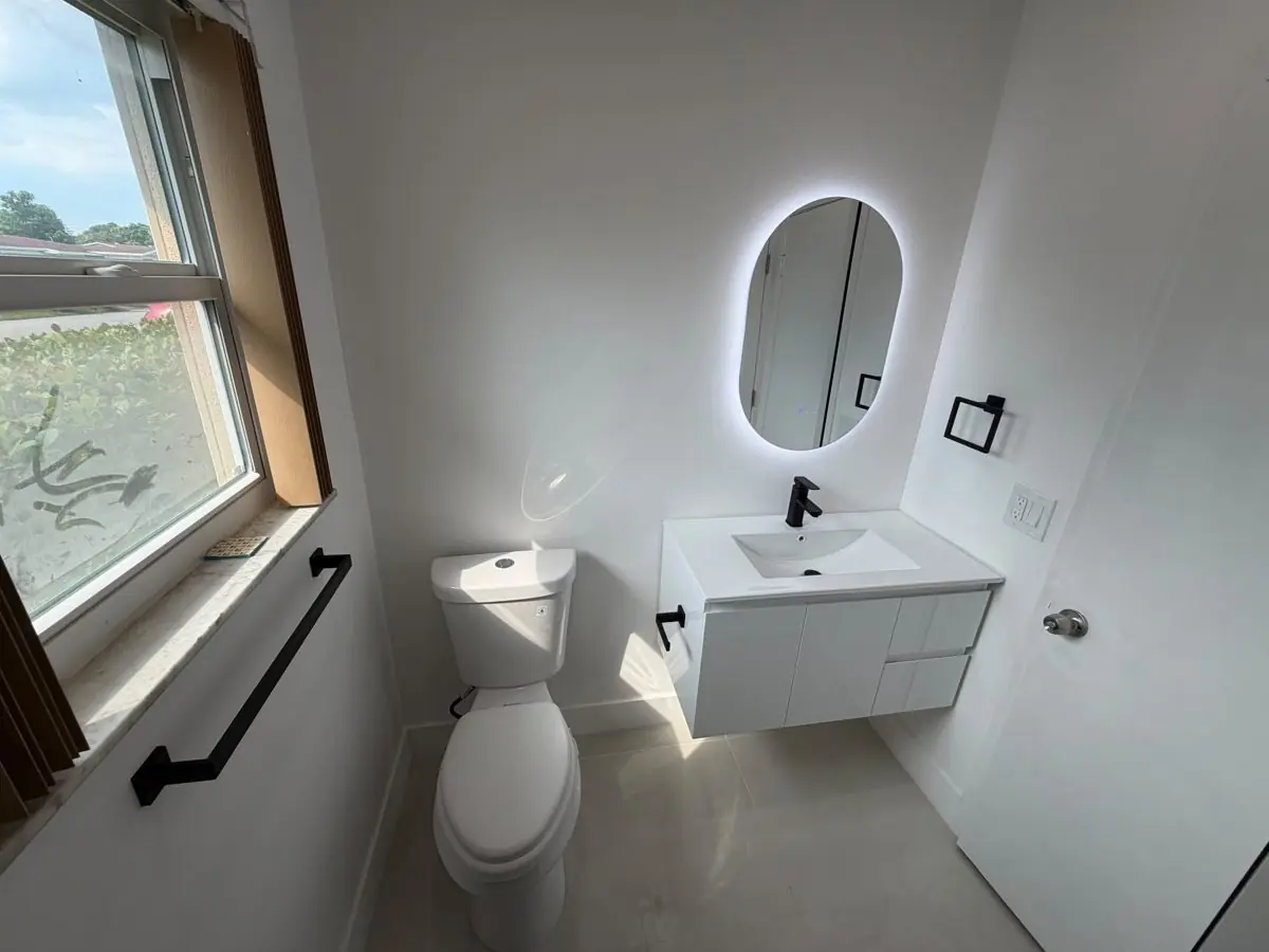 Guest and powder bathrooms — Bathroom remodel by Proper Roofing