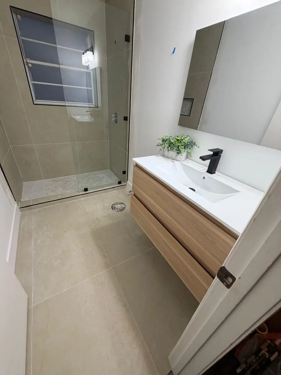 Guest and powder bathrooms — Bathroom remodel by Proper Roofing