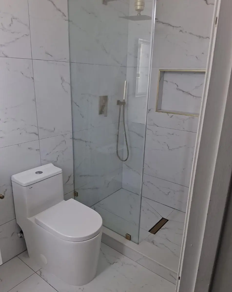Guest and powder bathrooms — Bathroom remodel by Proper Roofing