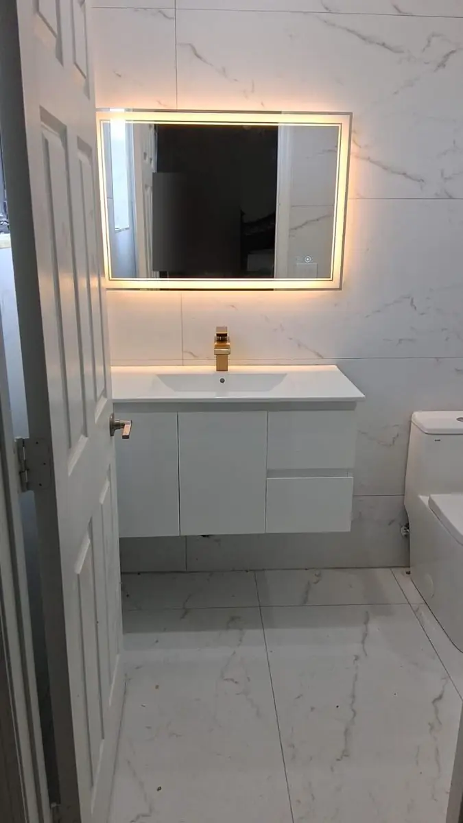 Guest and powder bathrooms — Bathroom remodel by Proper Roofing
