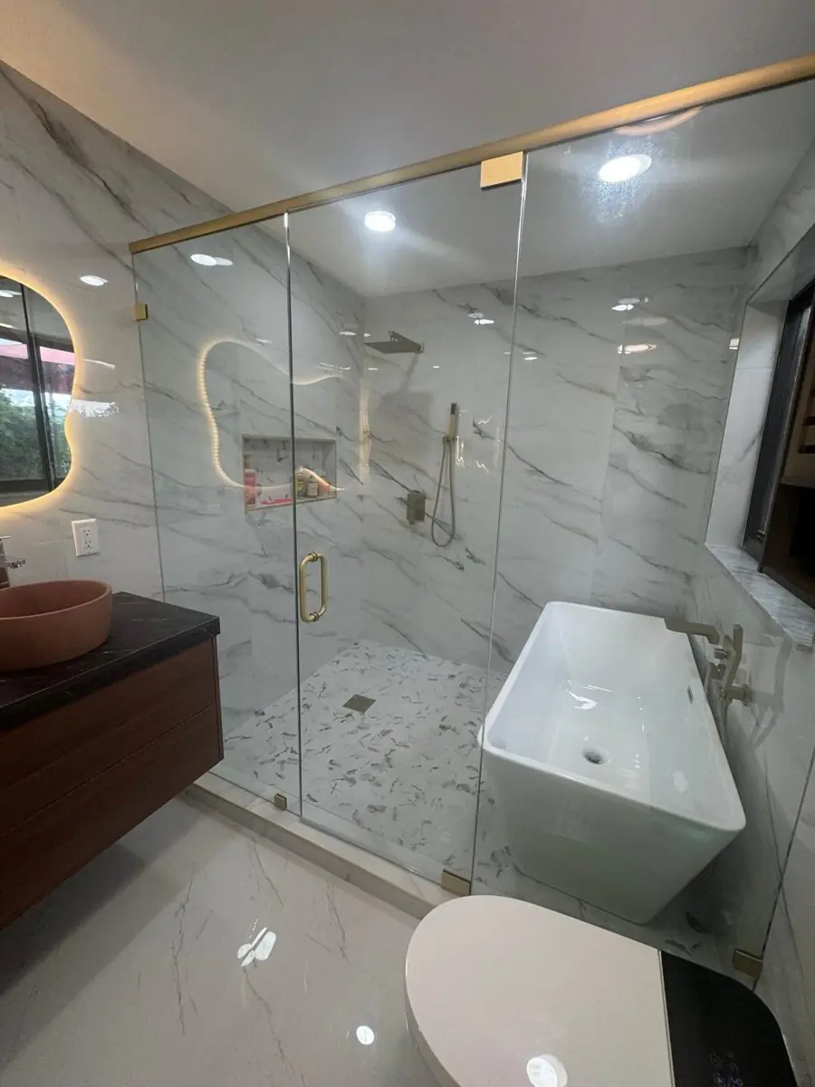 Walnut vanity, terracotta sinks — Bathroom remodel by Proper Roofing