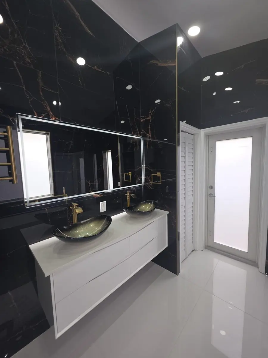 Black and gold master bath — Bathroom remodel by Proper Roofing
