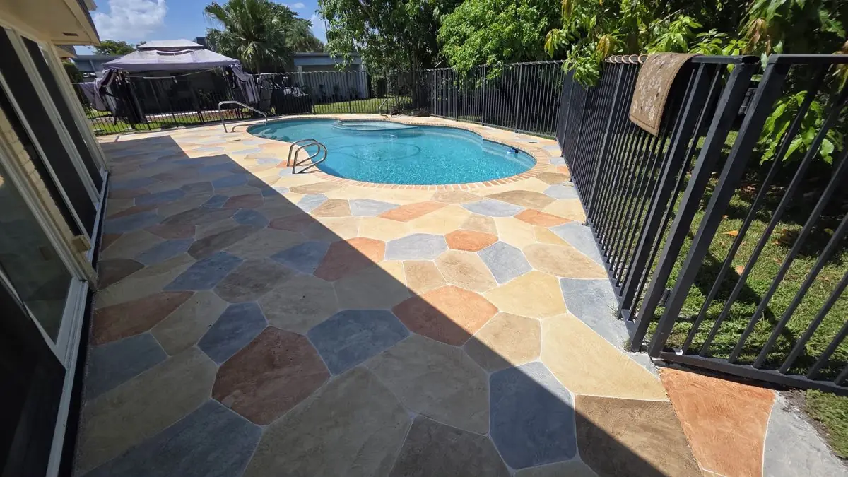 Stamped concrete pool decks and patios — Pool deck by Proper Roofing