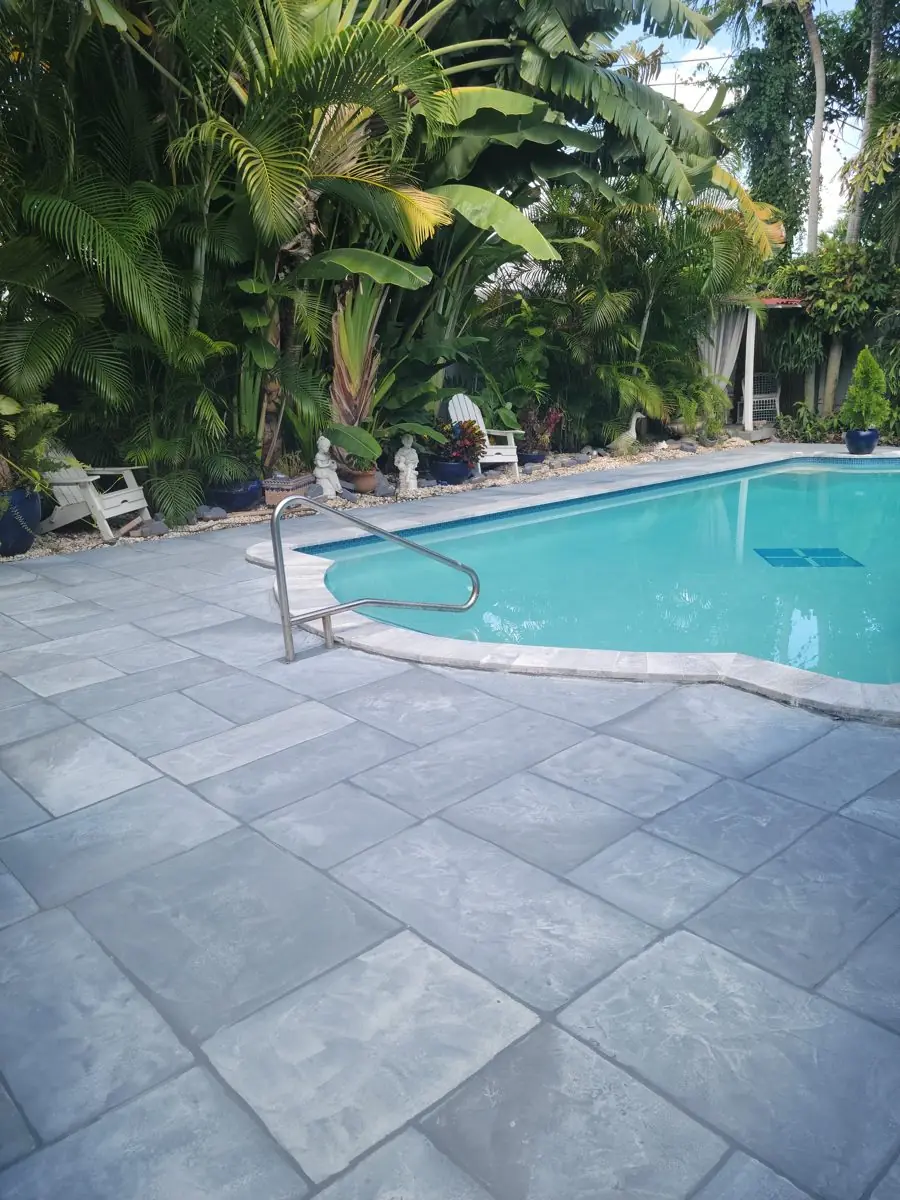 Stamped concrete pool decks and patios — Pool deck by Proper Roofing