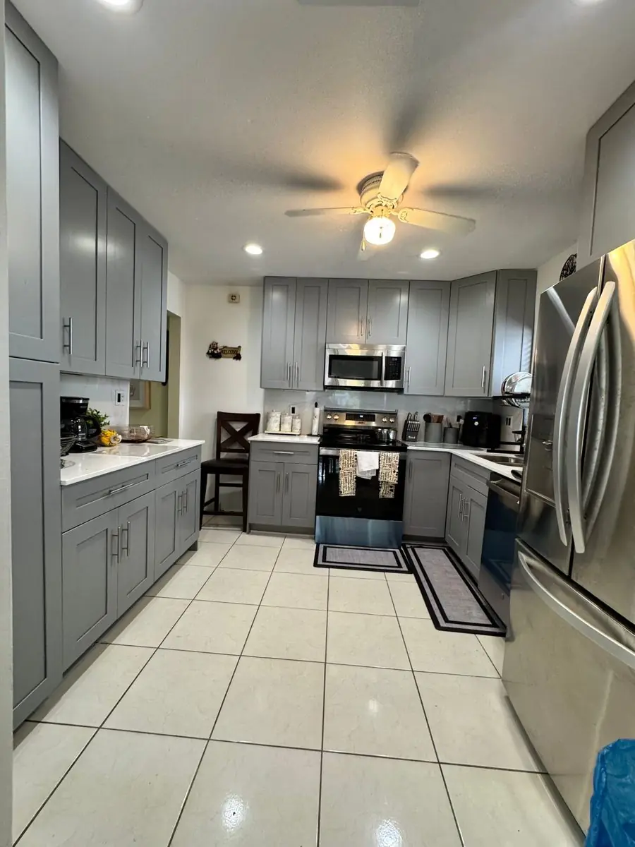 Grey shaker kitchen — Kitchen remodel by Proper Roofing