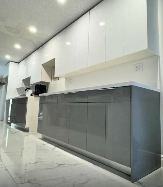 Grey high-gloss galley kitchen — Kitchen remodel by Proper Roofing