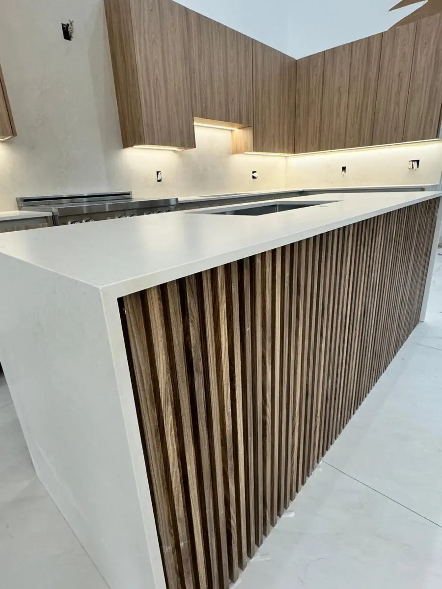Walnut slat island kitchen — Kitchen remodel by Proper Roofing