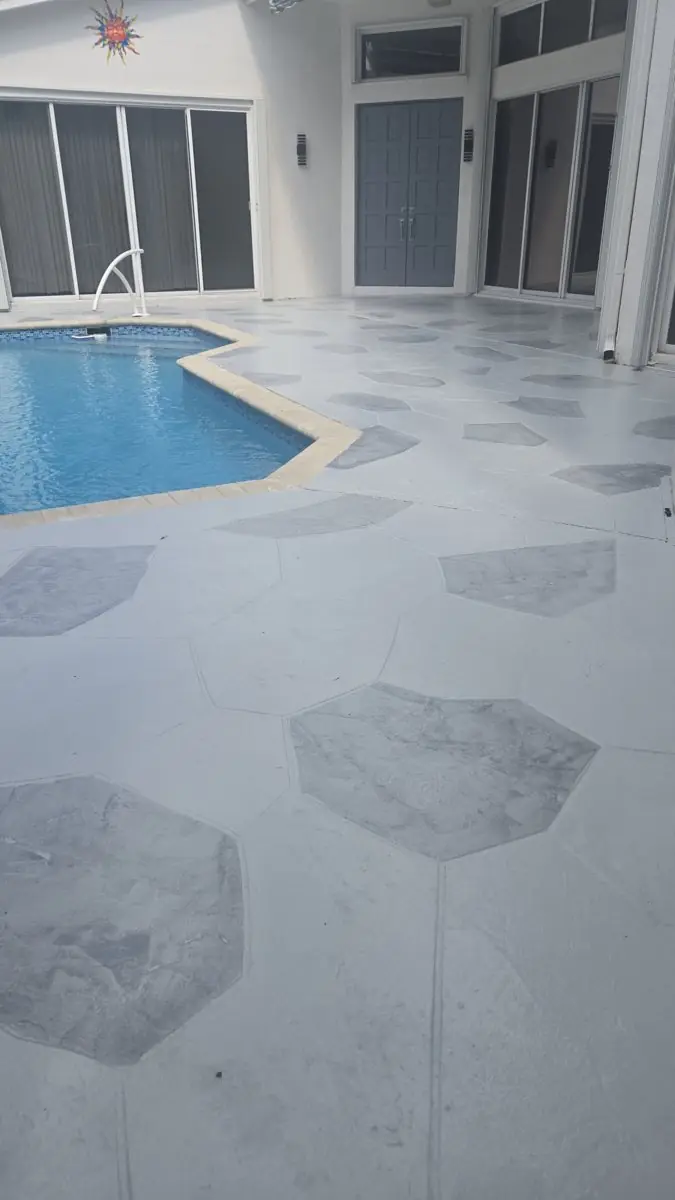 Stamped concrete pool decks and patios — Pool deck by Proper Roofing