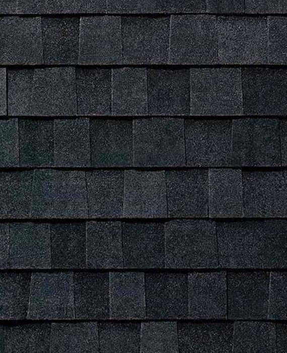 black asphalt roof shingles arranged in a pattern